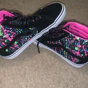 These are black suede, with pink pleather inside.